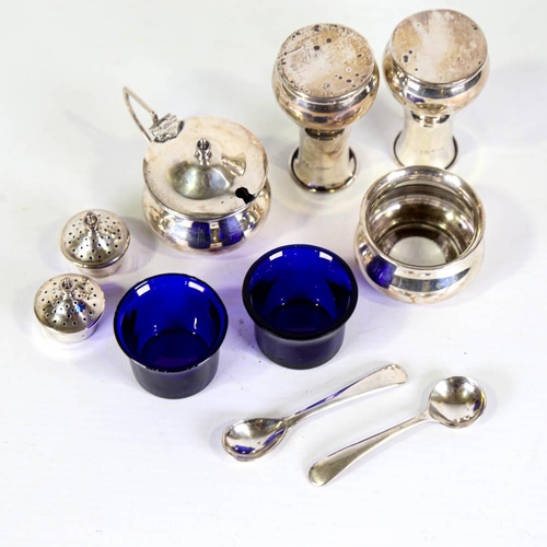 360 - A George V silver 4-piece cruet set, baluster form with blue glass liners, by F H Adams & Co, hallma... 