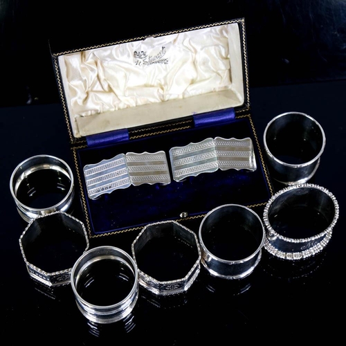 362 - 4 pairs of silver napkin rings, and 1 oval silver napkin ring, 7.3oz total (9)