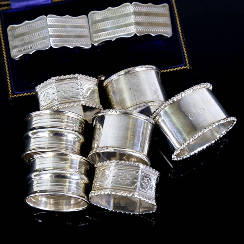 362 - 4 pairs of silver napkin rings, and 1 oval silver napkin ring, 7.3oz total (9)