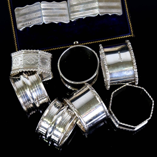 362 - 4 pairs of silver napkin rings, and 1 oval silver napkin ring, 7.3oz total (9)