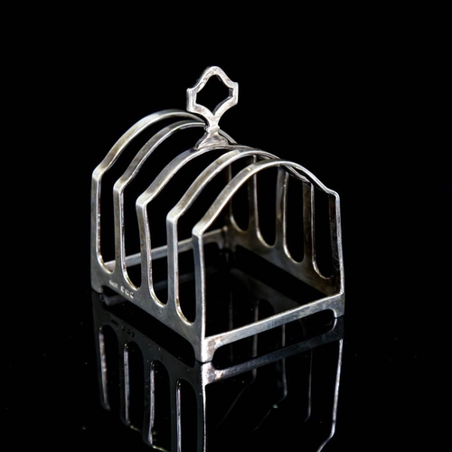 364 - A George V silver 5-bar toast rack, by Collingwood & Sons Ltd, hallmarks Birmingham 1923, length 8cm... 