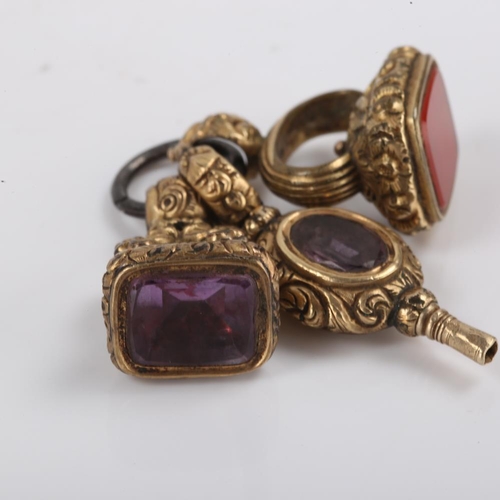 380 - 3 x 19th century gilt metal fobs, comprising amethyst pocket watch key and 2 stone set seal fobs, ke... 