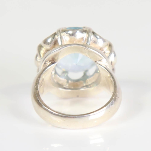 381 - A large modern handmade silver blue topaz crown ring, set with round cut topaz, setting height 21.1m... 