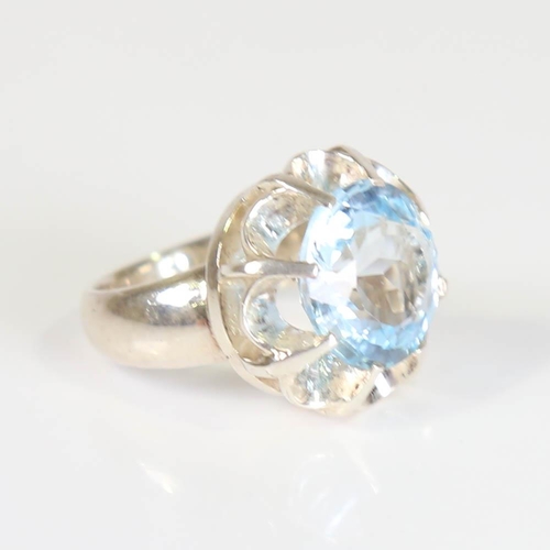 381 - A large modern handmade silver blue topaz crown ring, set with round cut topaz, setting height 21.1m... 