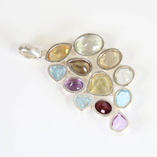 383 - A large modern handmade silver gem-set pendant, vari-cut gemstones include topaz, amethyst, garnet, ... 