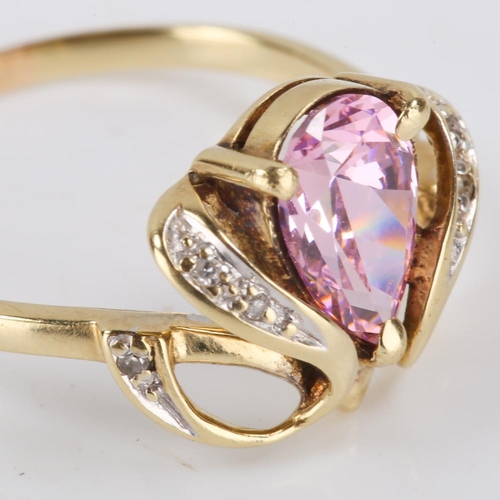 384 - A 14ct gold pink paste and diamond dress ring, openwork settings with pear cut paste and eight cut d... 