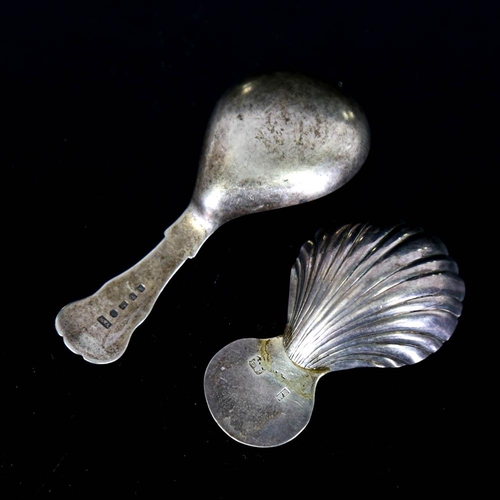 391 - 2 silver tea caddy spoons, comprising Georgian and Victorian examples, largest length 9cm (2)