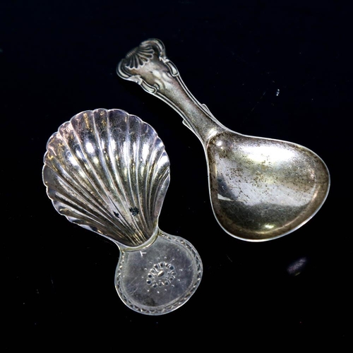 391 - 2 silver tea caddy spoons, comprising Georgian and Victorian examples, largest length 9cm (2)