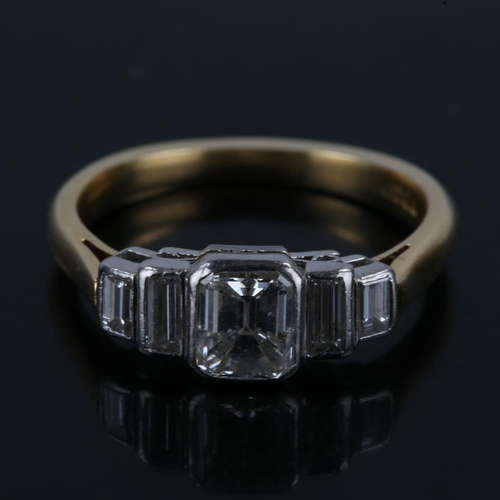 393 - A late 20th century 18ct gold graduated 5-stone diamond ring, set with principal emerald-cut diamond... 