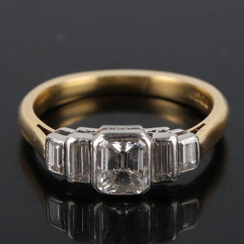 393 - A late 20th century 18ct gold graduated 5-stone diamond ring, set with principal emerald-cut diamond... 