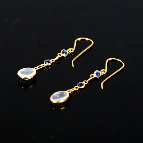 403 - A pair of modern handmade 14ct gold moonstone and sapphire drop earrings, set with oval cabochon moo... 