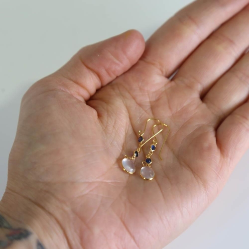 403 - A pair of modern handmade 14ct gold moonstone and sapphire drop earrings, set with oval cabochon moo... 