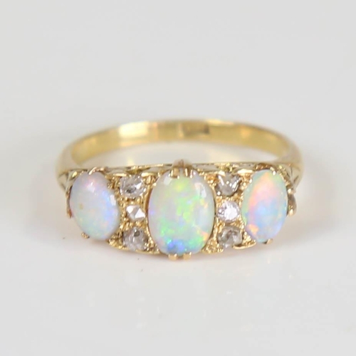 404 - An early 20th century 18ct gold 7-stone opal and diamond half hoop ring, set with oval cabochon opal... 