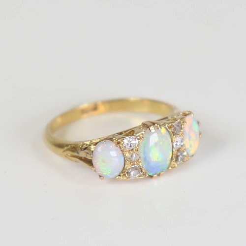 404 - An early 20th century 18ct gold 7-stone opal and diamond half hoop ring, set with oval cabochon opal... 