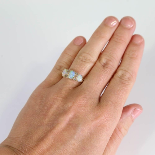 404 - An early 20th century 18ct gold 7-stone opal and diamond half hoop ring, set with oval cabochon opal... 