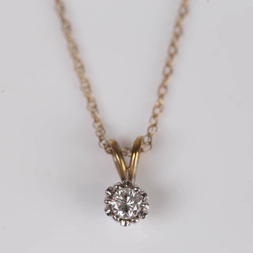 422 - A modern 9ct gold 0.25ct solitaire diamond pendant necklace, illusion setting with modern round bril... 