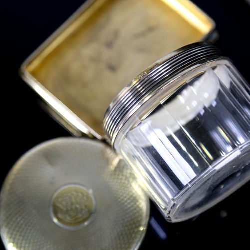 426 - ASPREY - 2 George V silver gilt-topped glass dressing table toilet jars, engine turned decoration, b... 