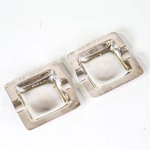 428 - A pair of George V Art Deco silver ashtrays, by Charles S Green & Co Ltd, hallmarks Birmingham 1937,... 