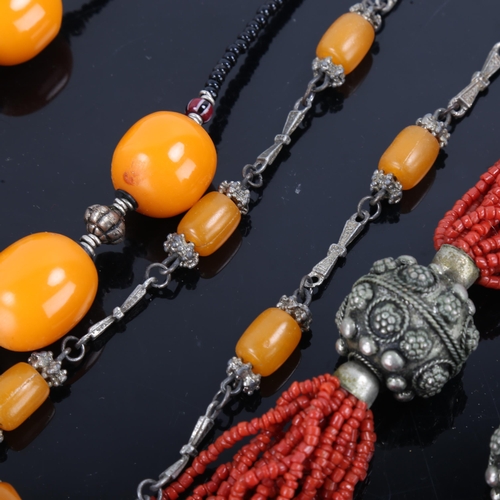 436 - 3 Eastern stone set necklaces, including coral and amber, unmarked white metal settings (3)