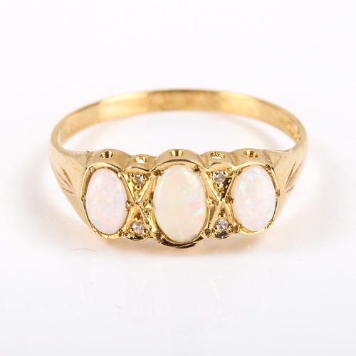 439 - A late 20th century 9ct gold 7-stone opal and diamond half hoop ring, set with oval cabochon opals a... 