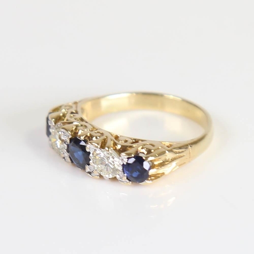 444 - A large 18ct gold 5-stone sapphire and diamond half hoop ring, set with round cut sapphires and roun... 