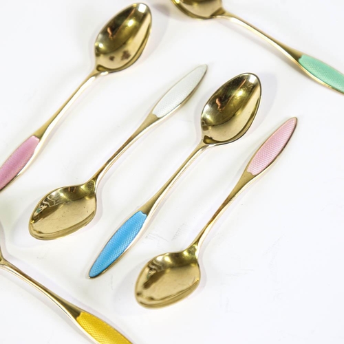 462 - FRIGAST - a set of 6 Danish vermeil sterling silver and harlequin enamel coffee spoons, engine turne... 