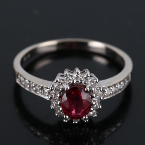 621 - A modern 18ct white gold synthetic ruby and diamond cluster ring, set with oval mixed cut ruby and r... 