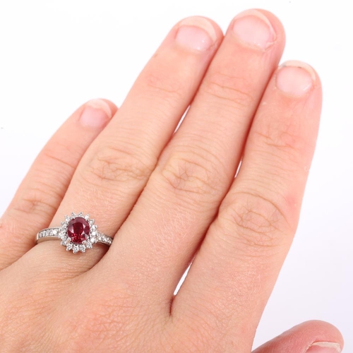 621 - A modern 18ct white gold synthetic ruby and diamond cluster ring, set with oval mixed cut ruby and r... 