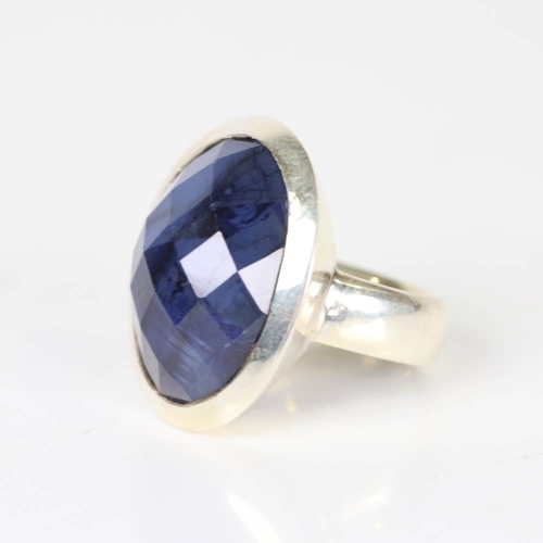 626 - A large modern handmade silver sapphire ring, set with large oval rose cut sapphire, setting height ... 