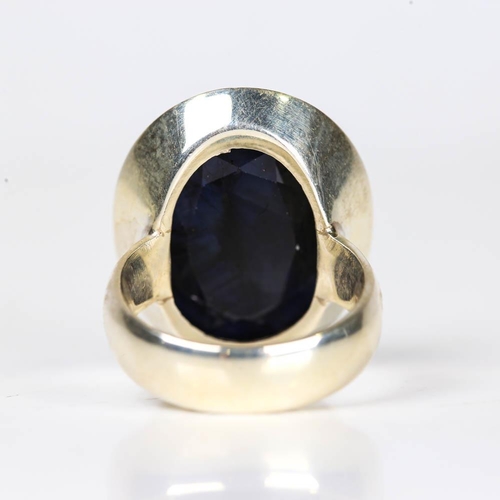 626 - A large modern handmade silver sapphire ring, set with large oval rose cut sapphire, setting height ... 