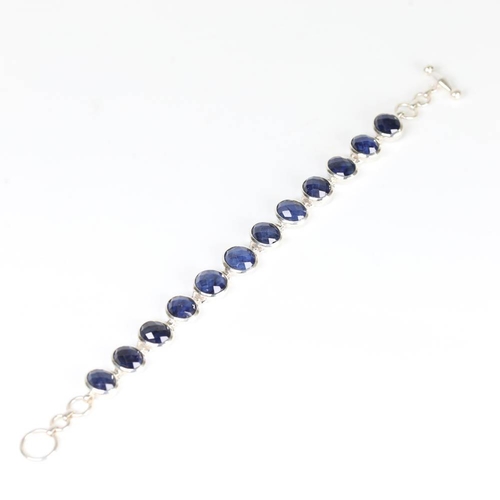 627 - A modern handmade silver sapphire line bracelet, set with rose cut sapphires, bracelet length 20cm, ... 