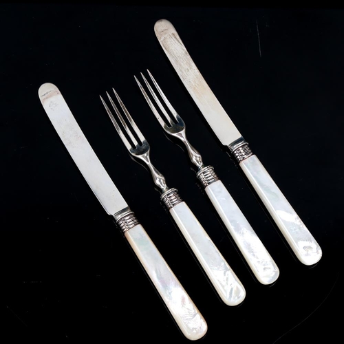 631 - An Edwardian silver-bladed mother of pearl handled dessert cutlery set for 12 people, by Elkington &... 