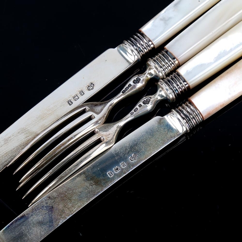 631 - An Edwardian silver-bladed mother of pearl handled dessert cutlery set for 12 people, by Elkington &... 