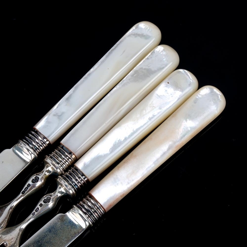 631 - An Edwardian silver-bladed mother of pearl handled dessert cutlery set for 12 people, by Elkington &... 