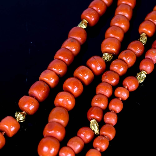 647 - A large graduated single strand polished coral prayer bead necklace, with unmarked high carat gold s... 