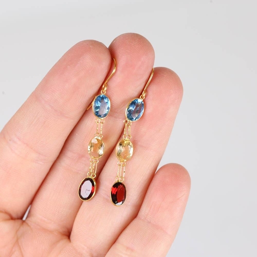 657 - A pair of modern handmade 14ct gold gem-set drop earrings, oval mixed cut gemstones include topaz an... 