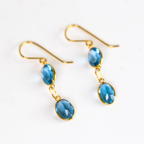 662 - A pair of modern handmade 14ct gold blue topaz drop earrings, set with oval mixed cut topaz and shep... 