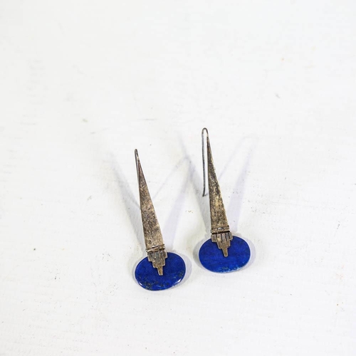 664 - A pair of Art Deco style silver and lapis lazuli pendant earrings, tapered geometric design with lap... 