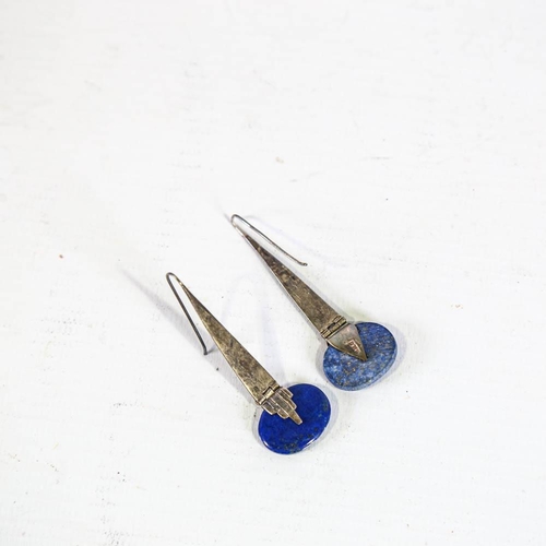 664 - A pair of Art Deco style silver and lapis lazuli pendant earrings, tapered geometric design with lap... 