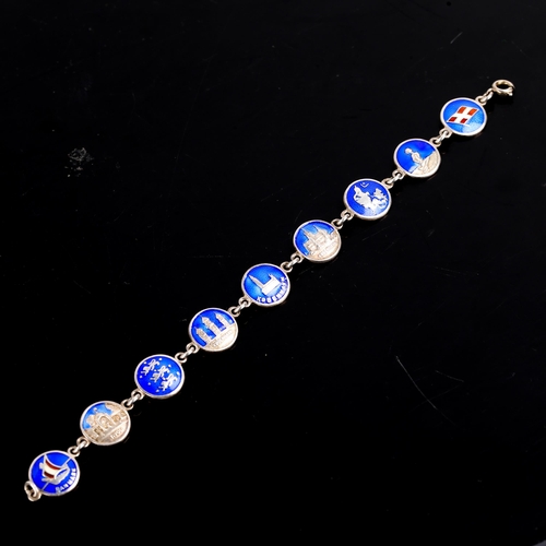 665 - VISCANDIA SCHOMACKER - a Vintage Danish novelty sterling silver and blue enamel charm bracelet, brac... 