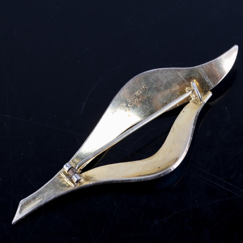 666 - FINN JENSEN - a Norwegian stylised vermeil sterling silver and blue enamel leaf brooch, brooch lengt... 