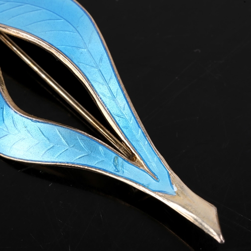 666 - FINN JENSEN - a Norwegian stylised vermeil sterling silver and blue enamel leaf brooch, brooch lengt... 