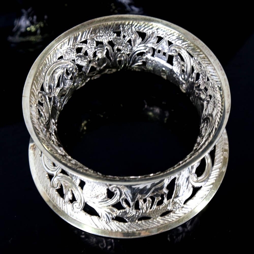 676 - An Edwardian Irish silver dish ring, pierced and relief embossed farmyard scene, by James Wakely and... 