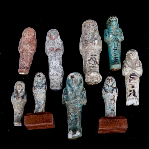 1001 - ANTIQUITIES - a group of Ancient Egyptian pottery shabti figures, including 4 faience glaze and some... 