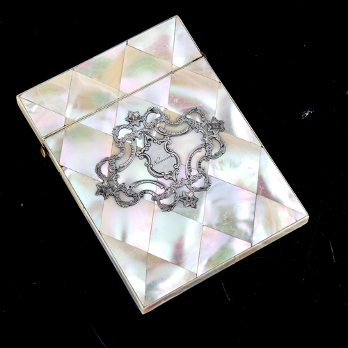 1005 - A Victorian mother-of-pearl parquetry card case, with inlaid silver decorated front, 10.5cm x 8cm