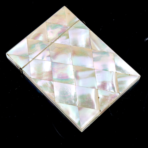 1005 - A Victorian mother-of-pearl parquetry card case, with inlaid silver decorated front, 10.5cm x 8cm