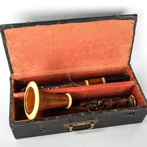 1052 - BUTHOD & THIBOUVILLE - an early 19th century boxwood ebony and ivory clarinet, length 66cm