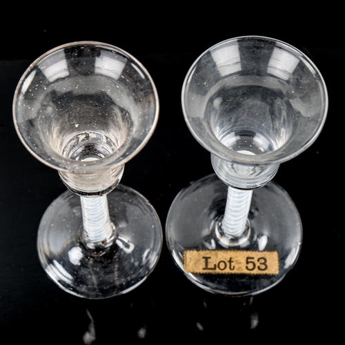 1065 - 2 similar 18th century cordial glasses, with milk twist stems, height 16.5cm