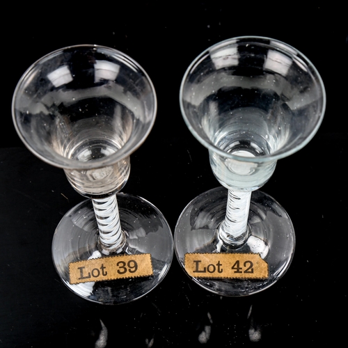 1066 - 2 similar 18th century cordial glasses, with milk twist stems, height 17cm