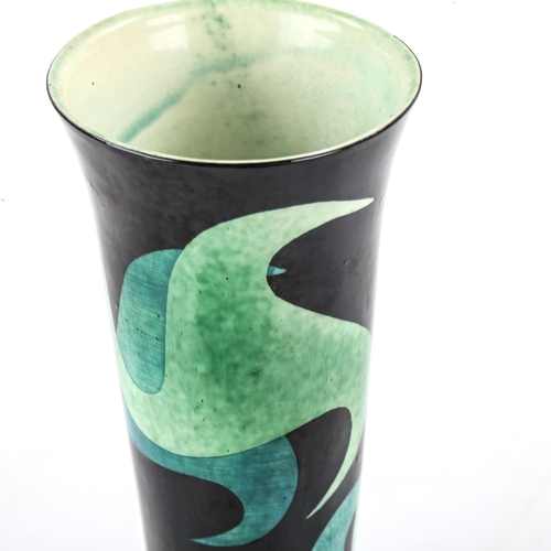 1083 - Jane Cox, Studio pottery vase of tapered form, green stylised decoration, signed under base, height ... 